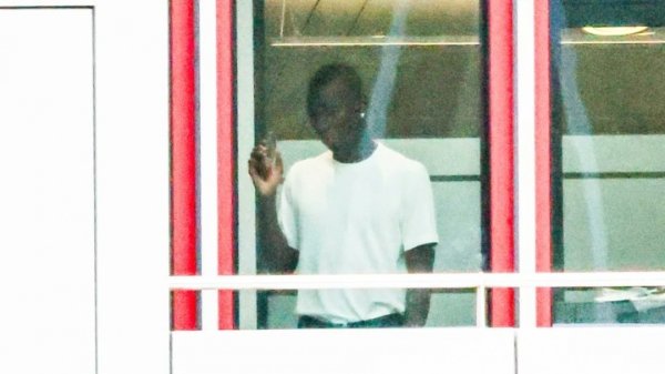 Can you recognize Ge Ge? Photographer: Jackson and his agent appear on Sebena Street